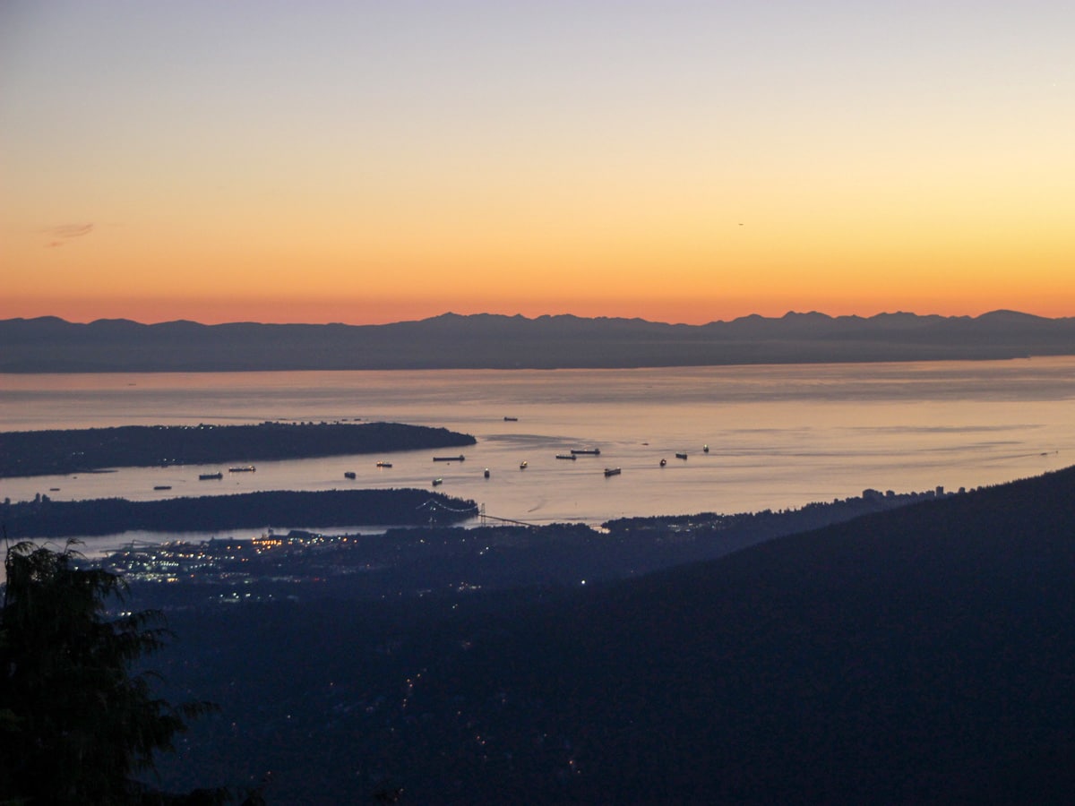 Hazy sunset looking down on the port from North Shore Dog Mountain in BC