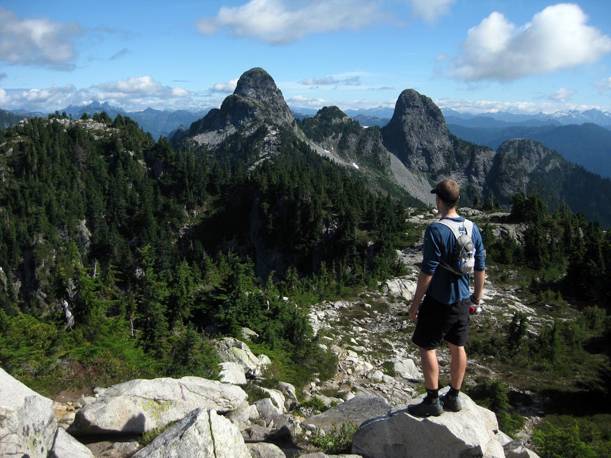 Hiker admires view from Howe Sound Crest trail in North Shore region