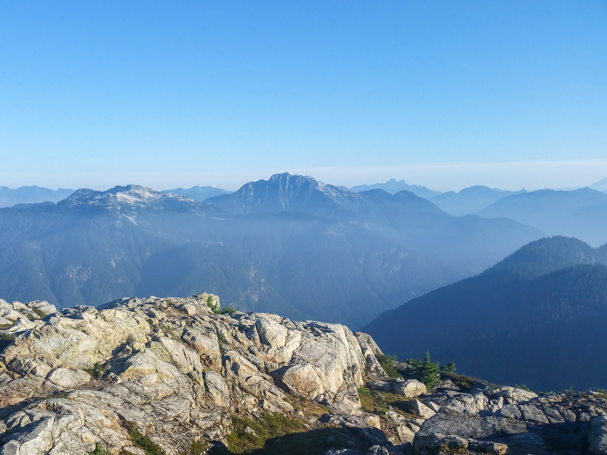 Distant BC mountain ranges viewed from Mount Seymour in North Shore region of British Columbia