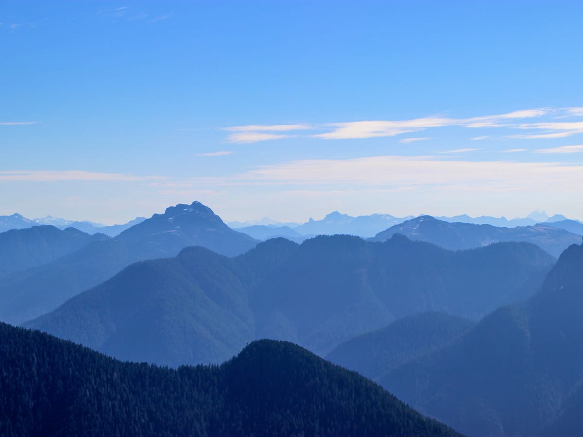 View of British Columbia mountain ranges from Mount Strachan hike in North Shore area BC