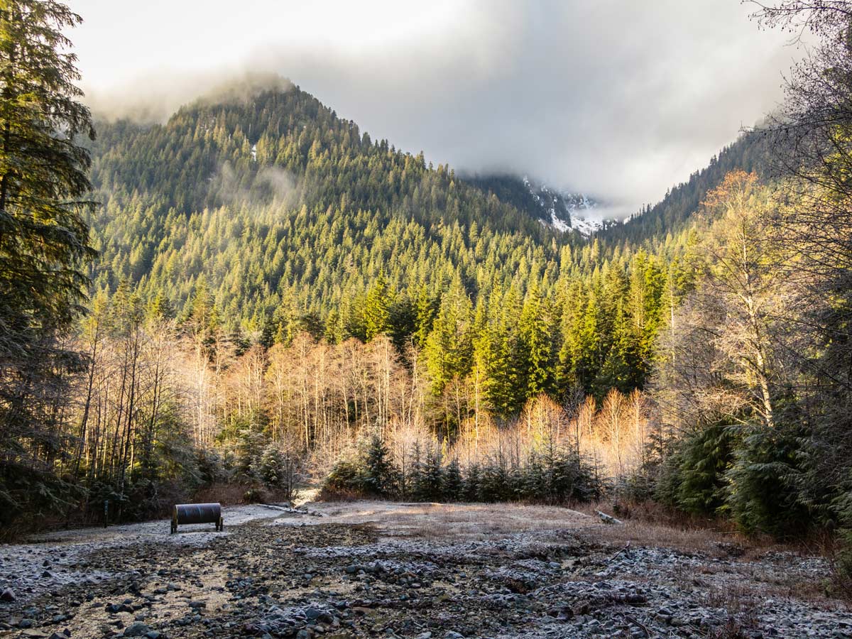 Mountains and river along the trail to Norvan Falls in North Shore region of BC