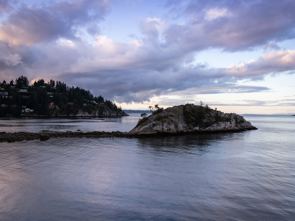 Small island and coastal homes across the bay from Whytecliff Park beach in North Shores area
