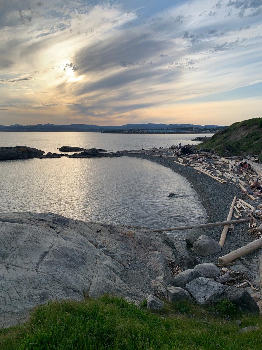 Beautiful beach sunset by Ogden Point and Dallas Road hiking near Victoria