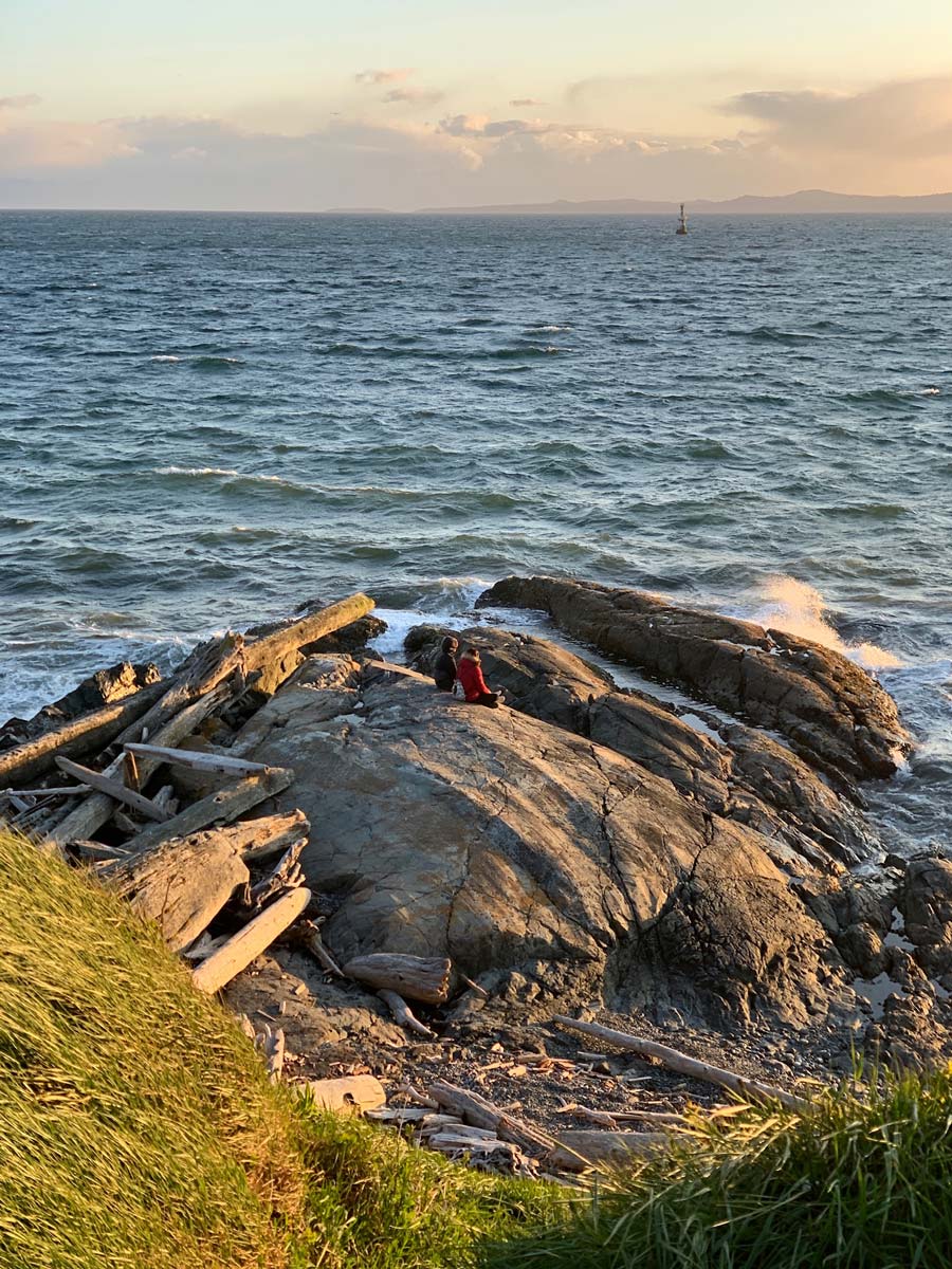 Enjoying a beautiful sunset by the ocean at Ogden Point and Dallas Road hiking around Victoria