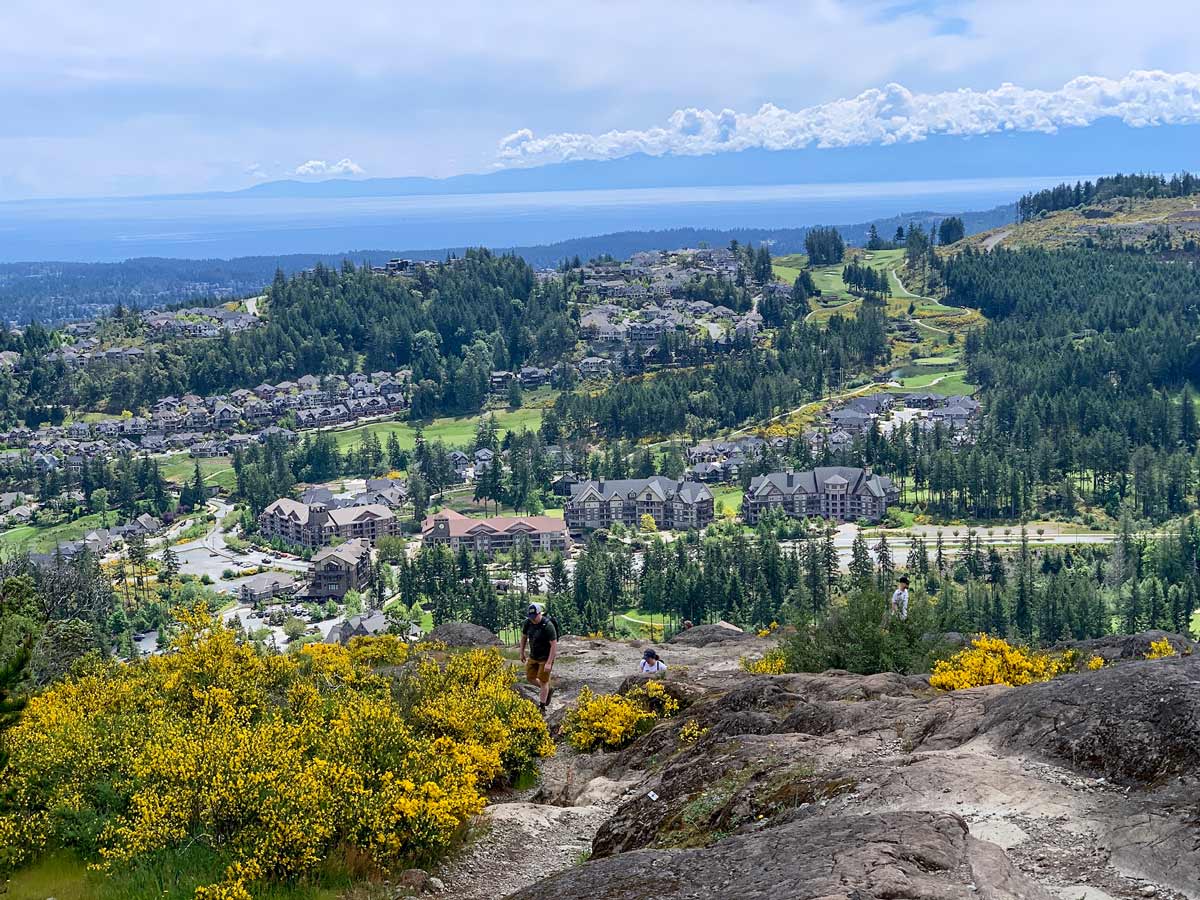 Hikers climb Mount Finlayson high above Victoria British Columbia