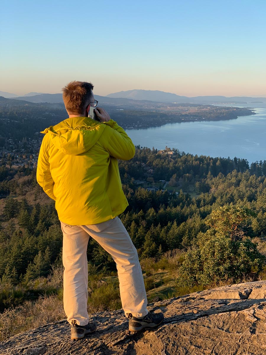 Admiring the sunset from Mount Doug hiking near Victoria