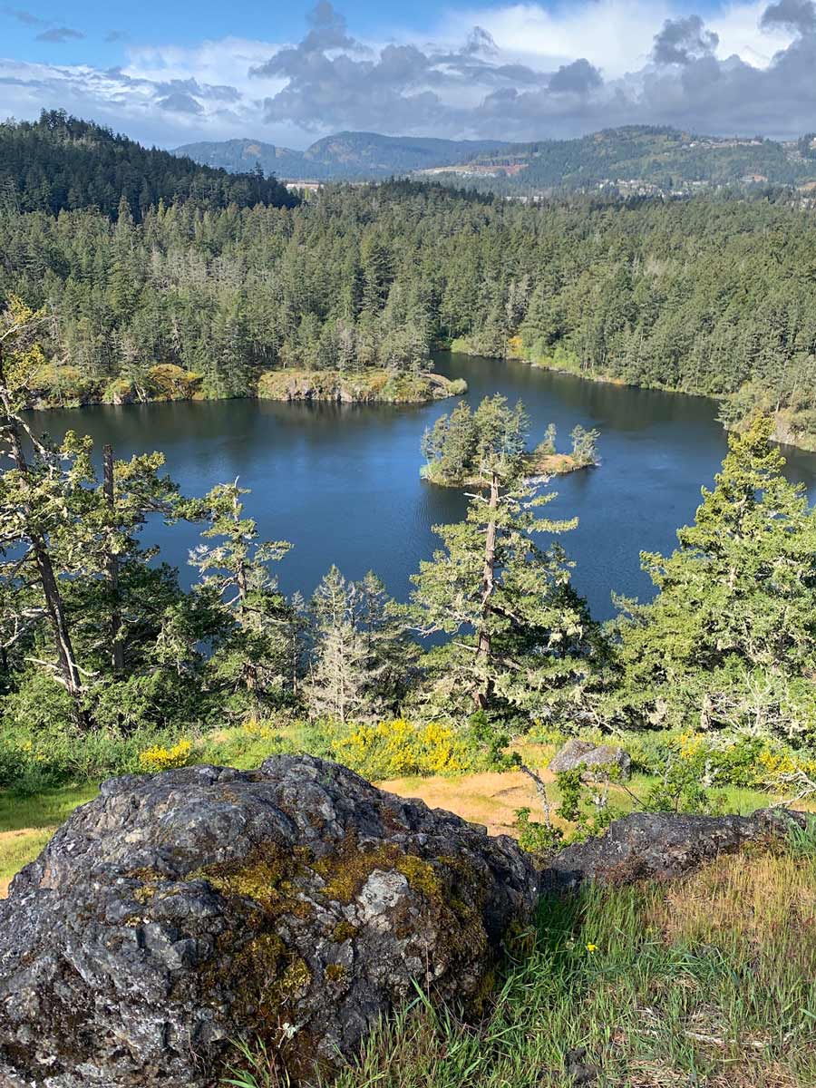 Beautiful view looking down on Thetis Lake on one of the best hikes near Victoria