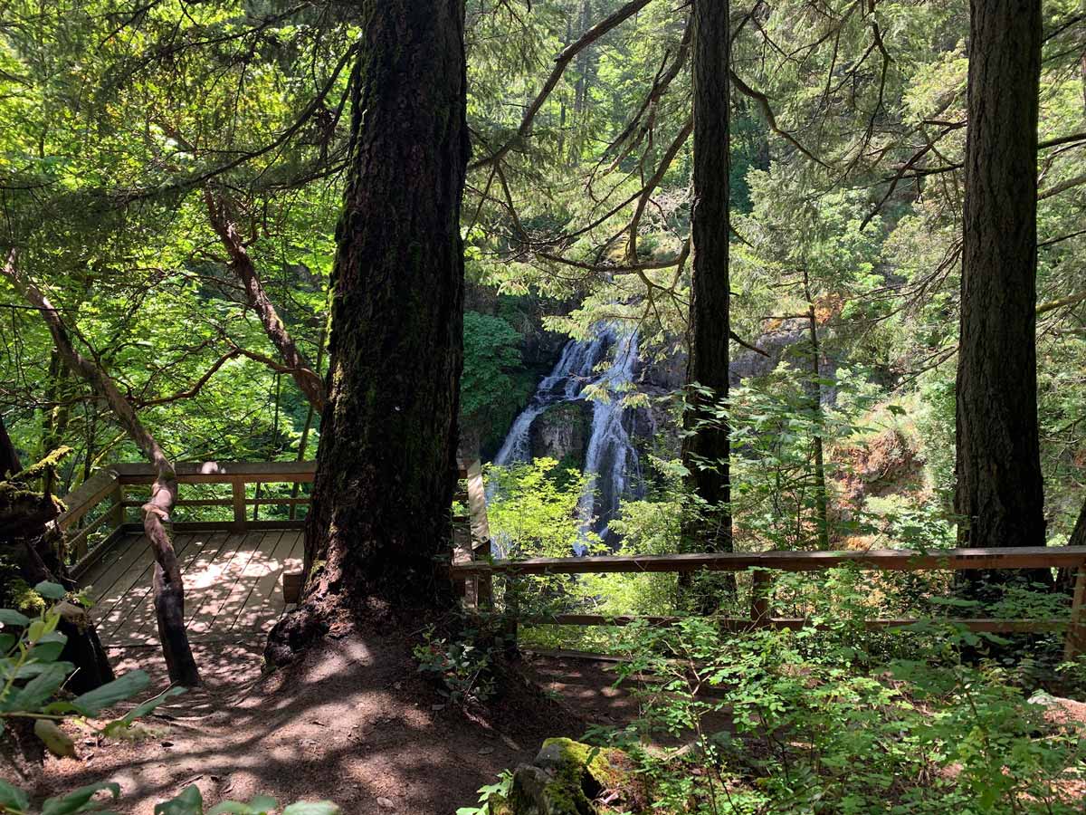 Lookout deck above natural waterfalls near Wittys Lagoon hiking around Victoria BC