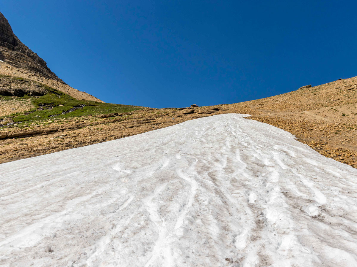 Looking up at remains of a glacier on Siyeh Pass