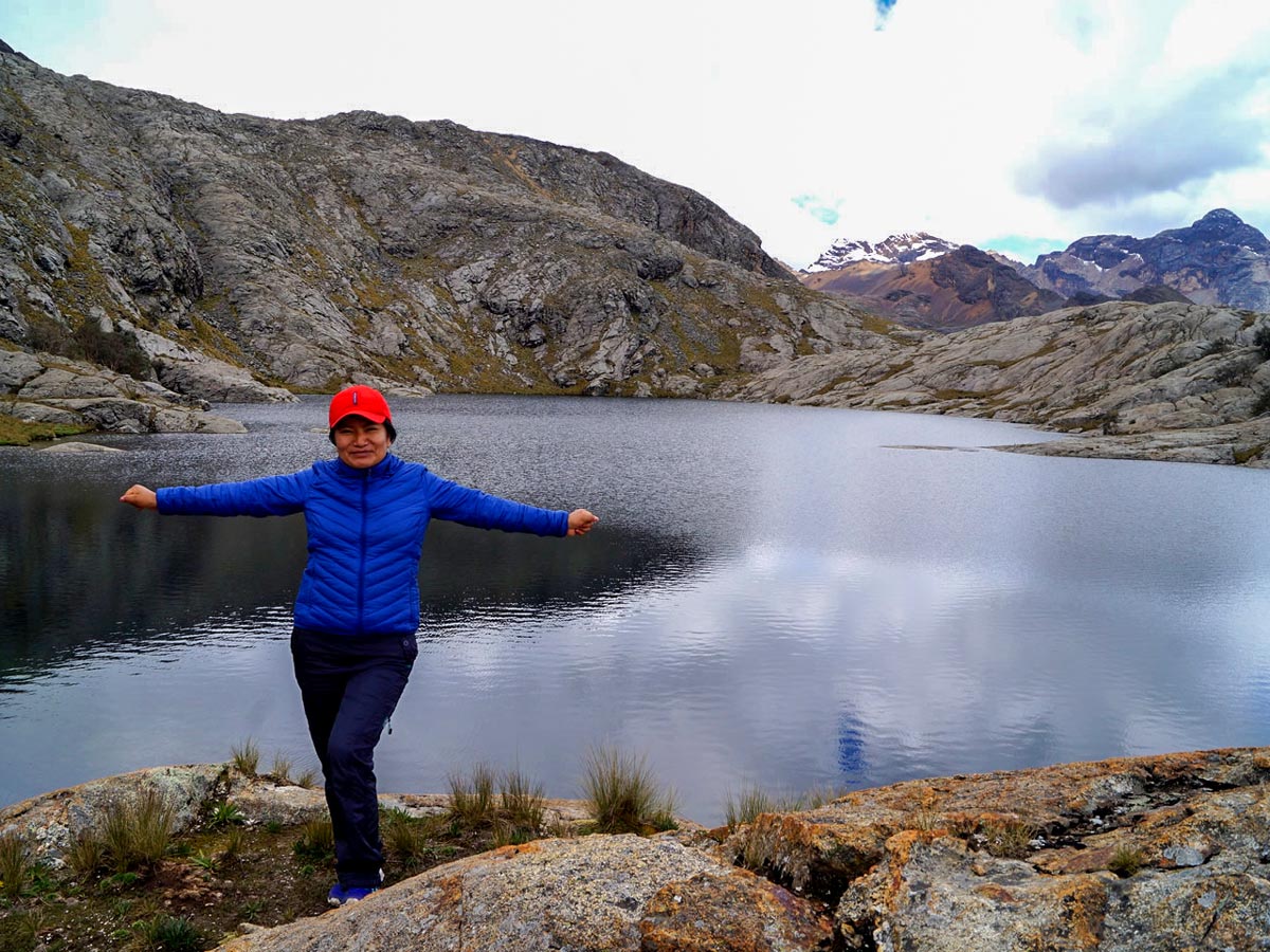 Hiker enjoys mountain top Lake Awak