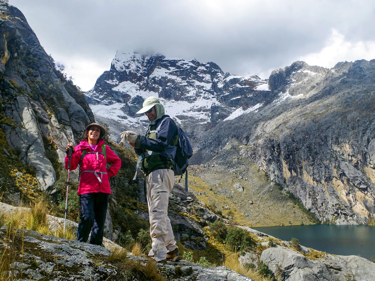 Smiling hikers at Lake Churup in Huar