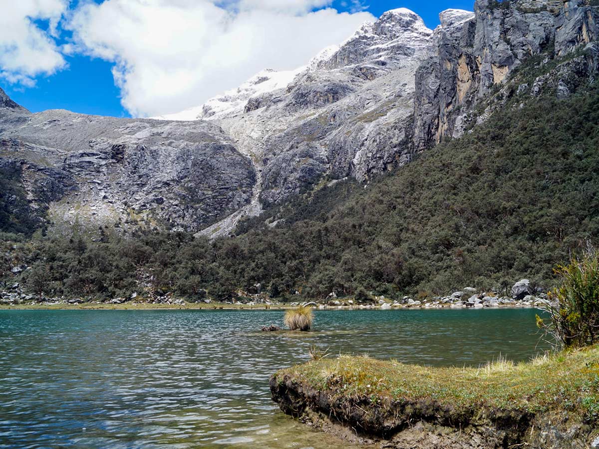 Rocky hills over Lake Uruscocha