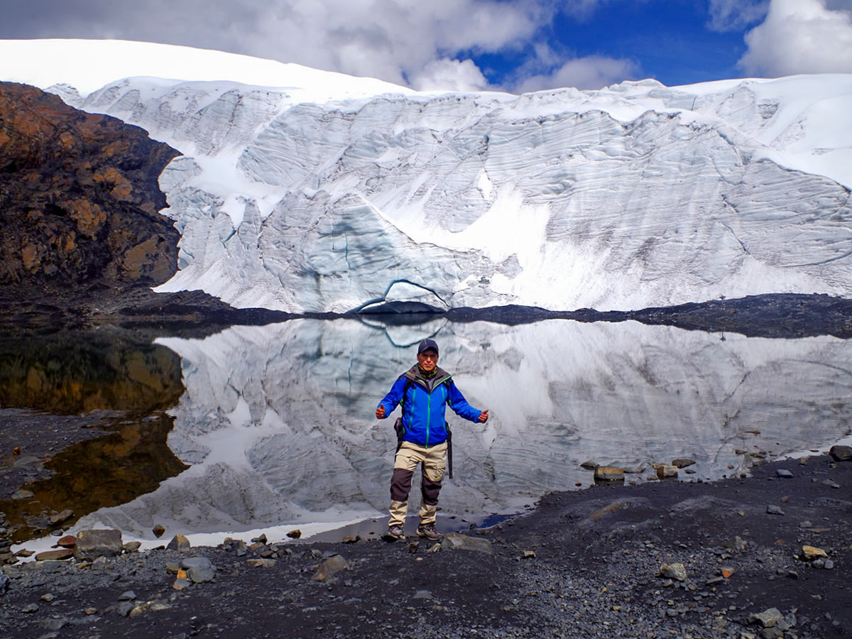 Hiker in front of beautiful Pastoruri Glacier