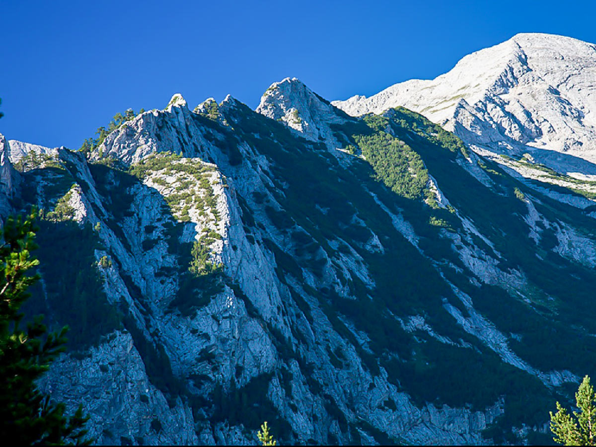 Descend down to Yavorov valley and look back to the face of Mt Razlojki Suhodol first part of the fourth stage