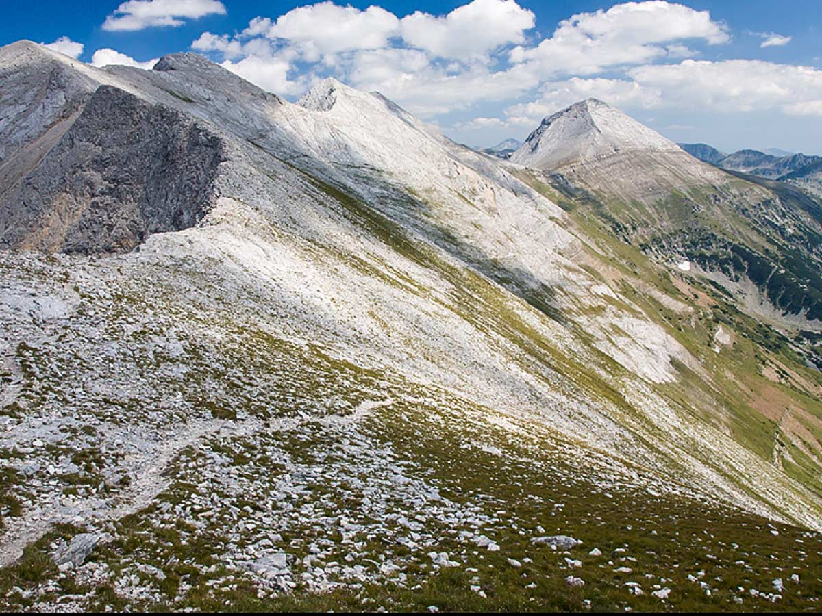 Descend down to Yavorov valley and look back to the face of Mt Razlojki Suhodol first part of the fourth stage