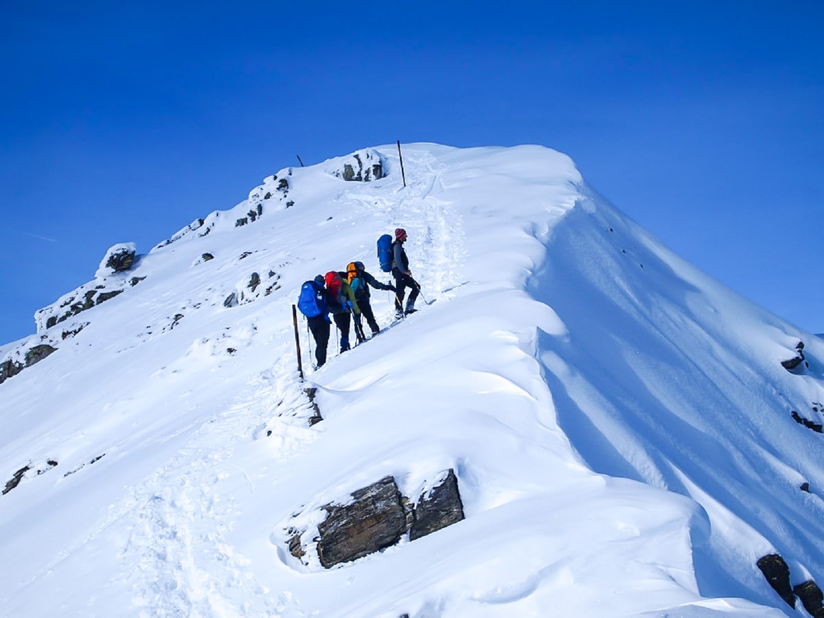 Hikers Mountaineers are just 15 minutes away from the summit hiking Mount Malyovitsa in Bulgaria