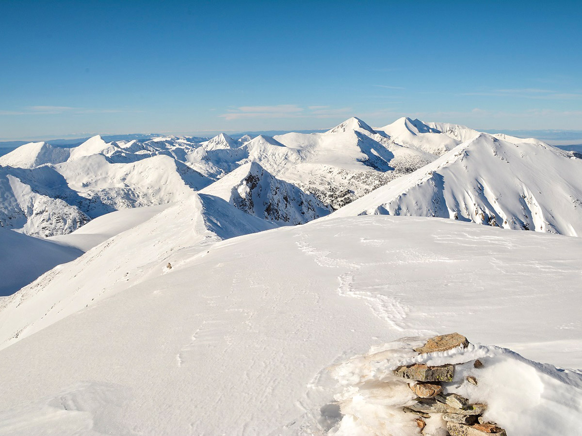 View from Polejan to the west. Of the two giants in the distance the one to the left is Mt