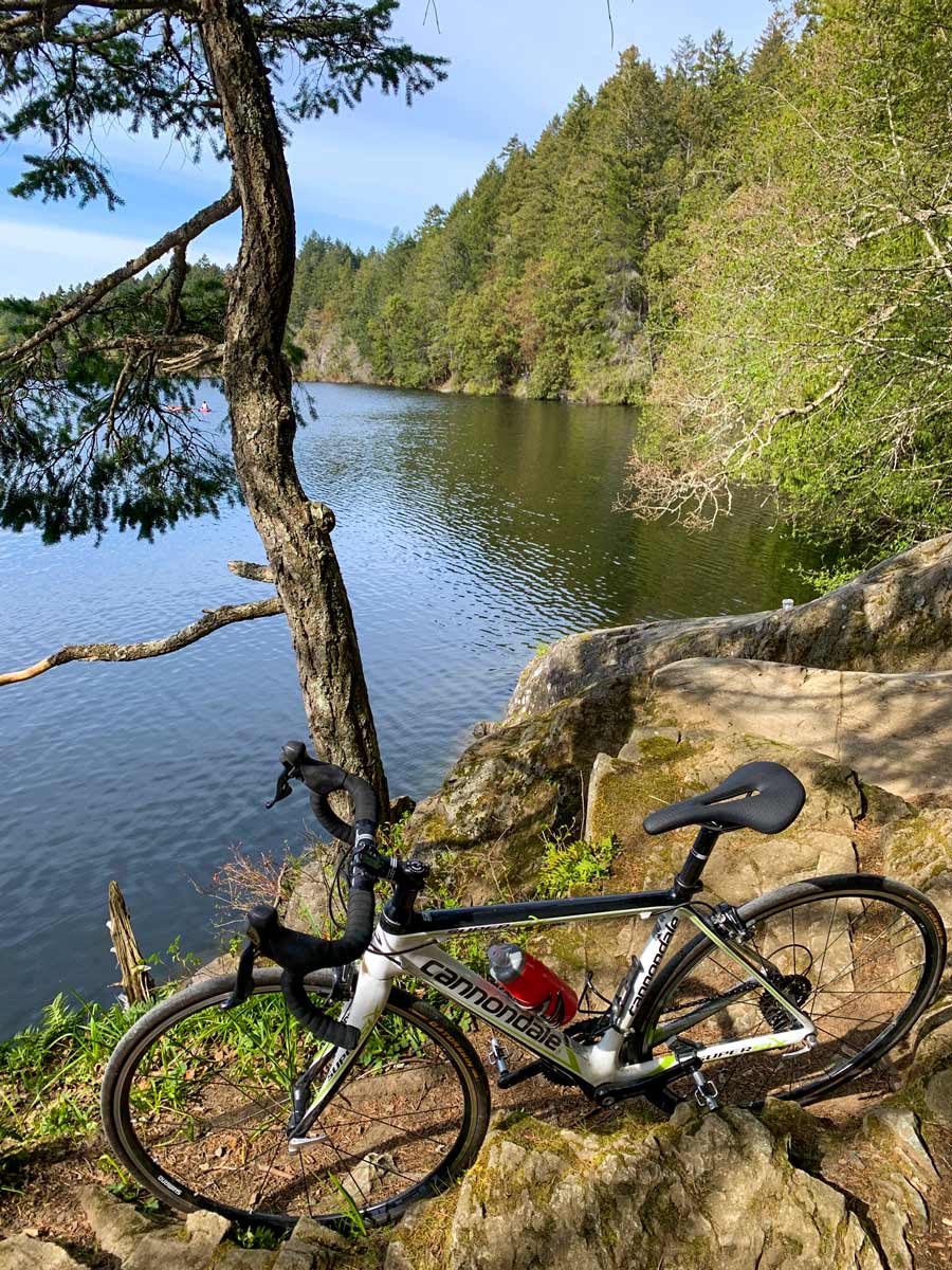 Break on the rocky banks around Thetis Lake biking from Galloping Goose to Thetis Lake near Victoria