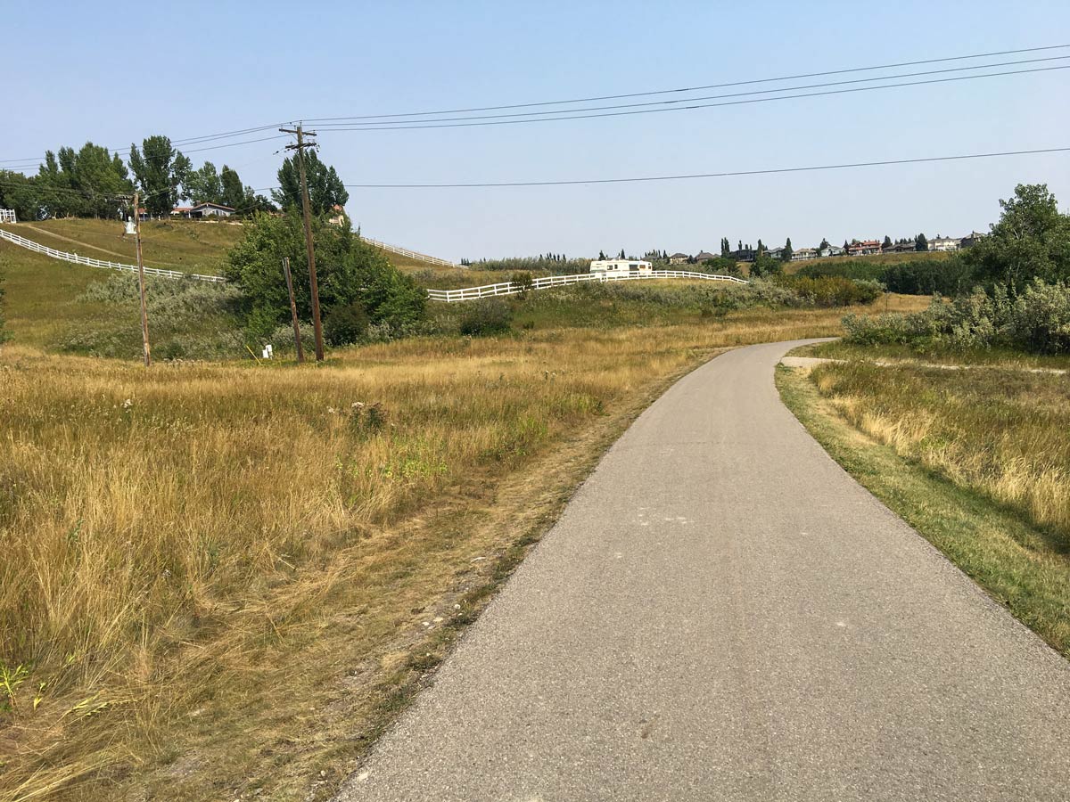 Paved biking walking trails throughout Fish Creek Park in Calgary