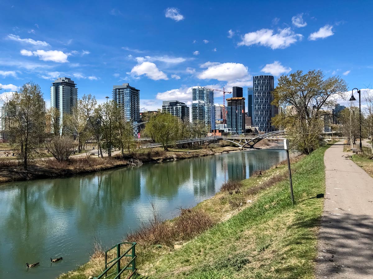 Biking the riverside Bow River Parkway past Downtown Calgary