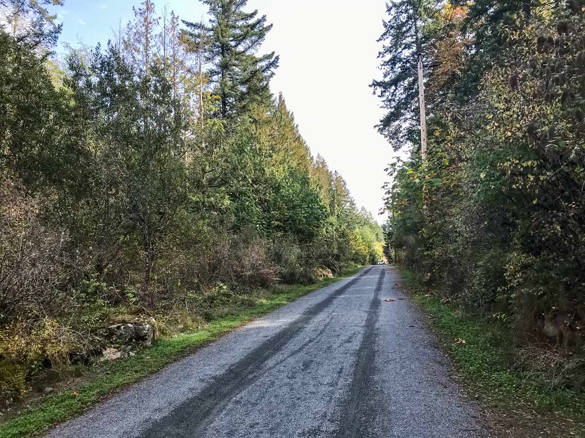 Cycling rural roads along Colquitz River Trail near Victoria British Columbia