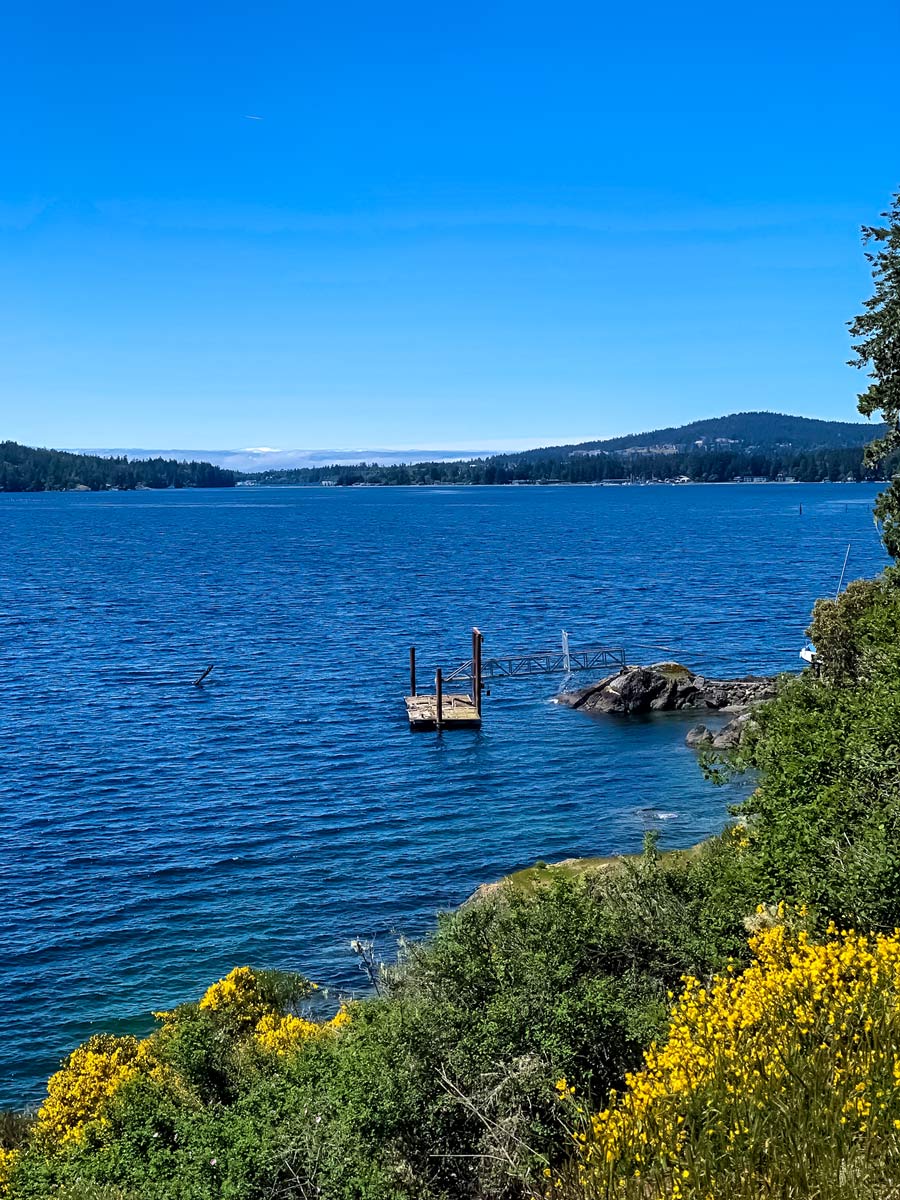 Wavy ocean waters seen from Goose to Sooke Potholes bike trail near Victoria