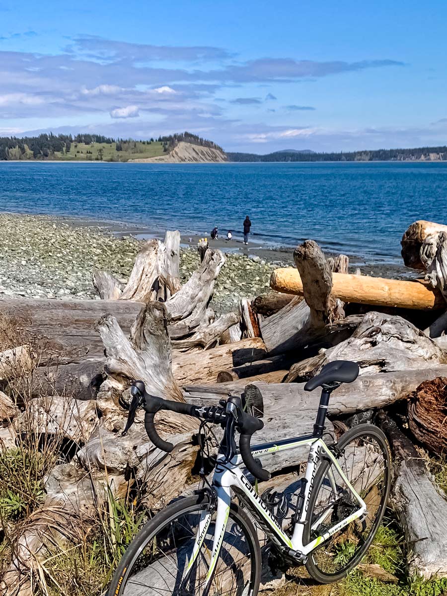 Biking by the beach on Lochside Trail near Victoria BC