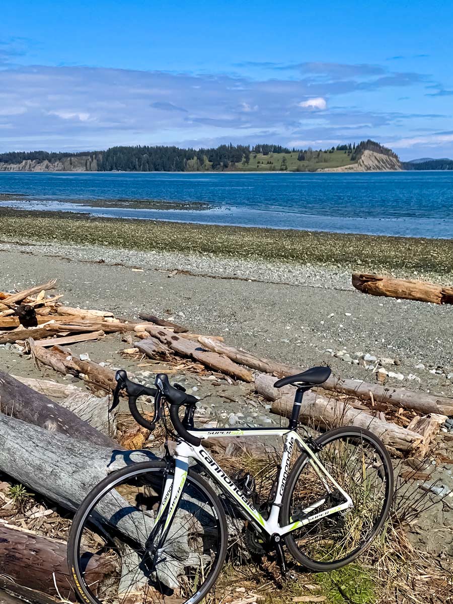 Biking Lochside Trail by the beach near Victoria BC