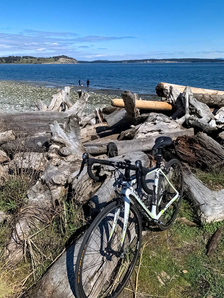 Biking Lochside Trail by the beach near Victoria BC