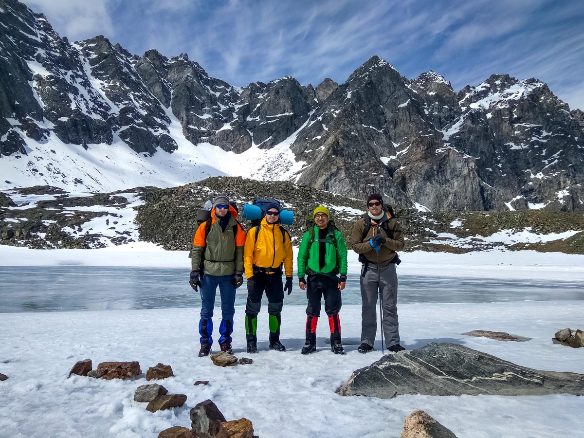 Four backpackers during the winter