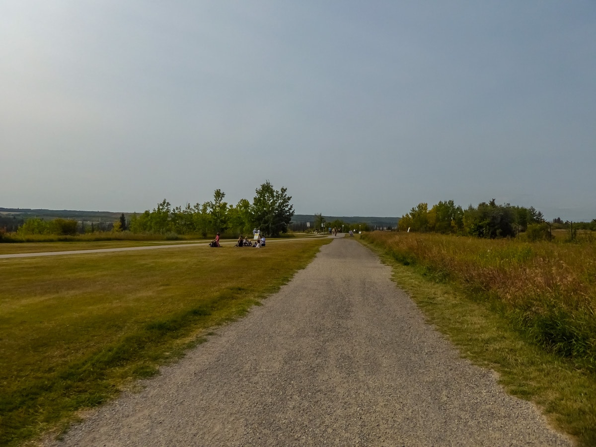 Prairie storm approaching over Weaselhead Flats hiking trails in Calgary