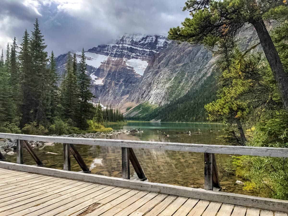 View of Cavell Lake from hiking path bridge in Jasper Alberta Canada