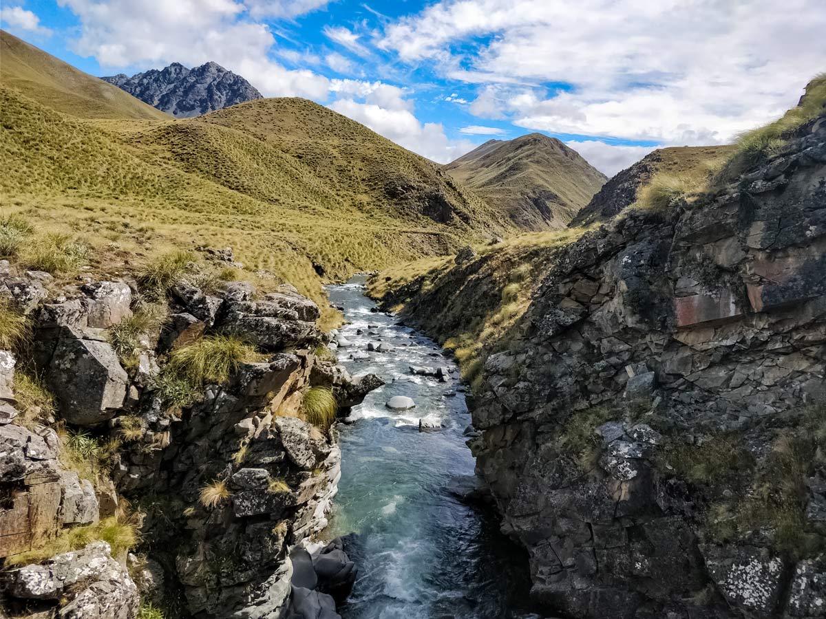 Crossing rivers plains and mountains along Te Araroa trail trekking in New Zealand