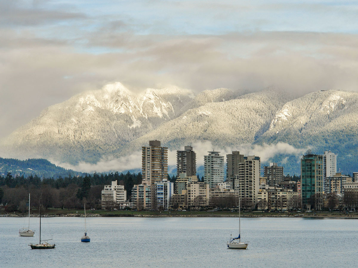 Vancouver New Westminster city skyline winter mountains