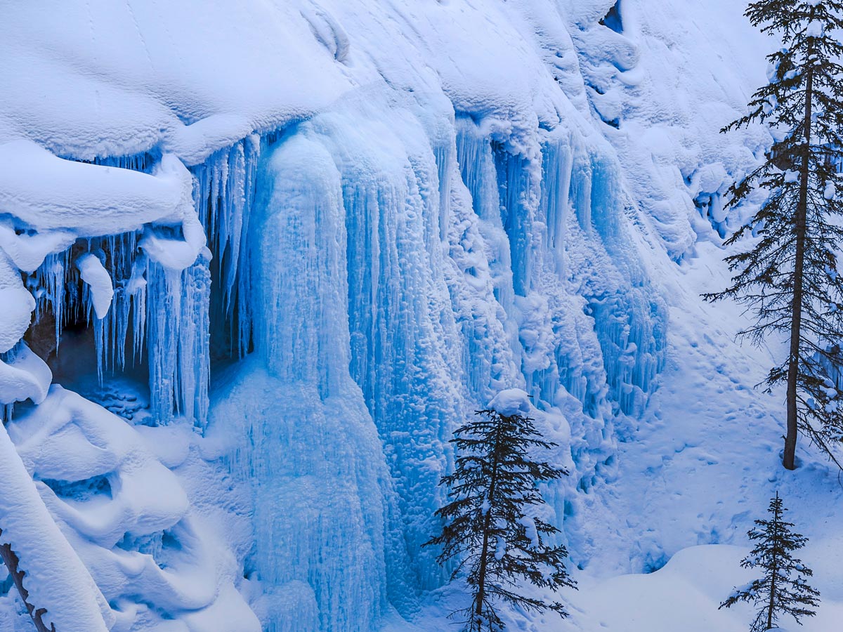 Hiking to frozen waterfalls Jonhston Canyon winter hike near Banff Canada