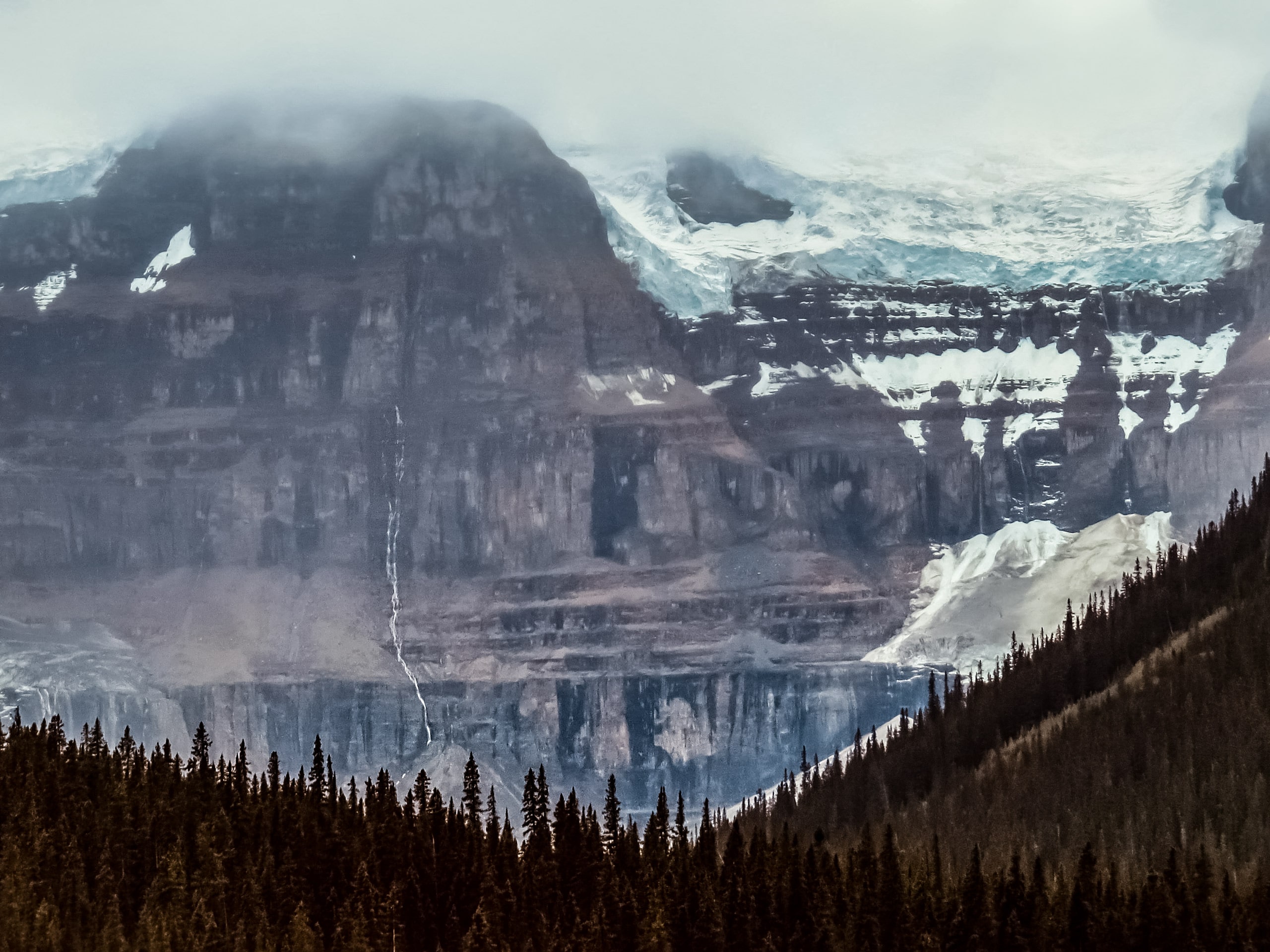 Cascade Falls waterfalls in the fog Banff National Park