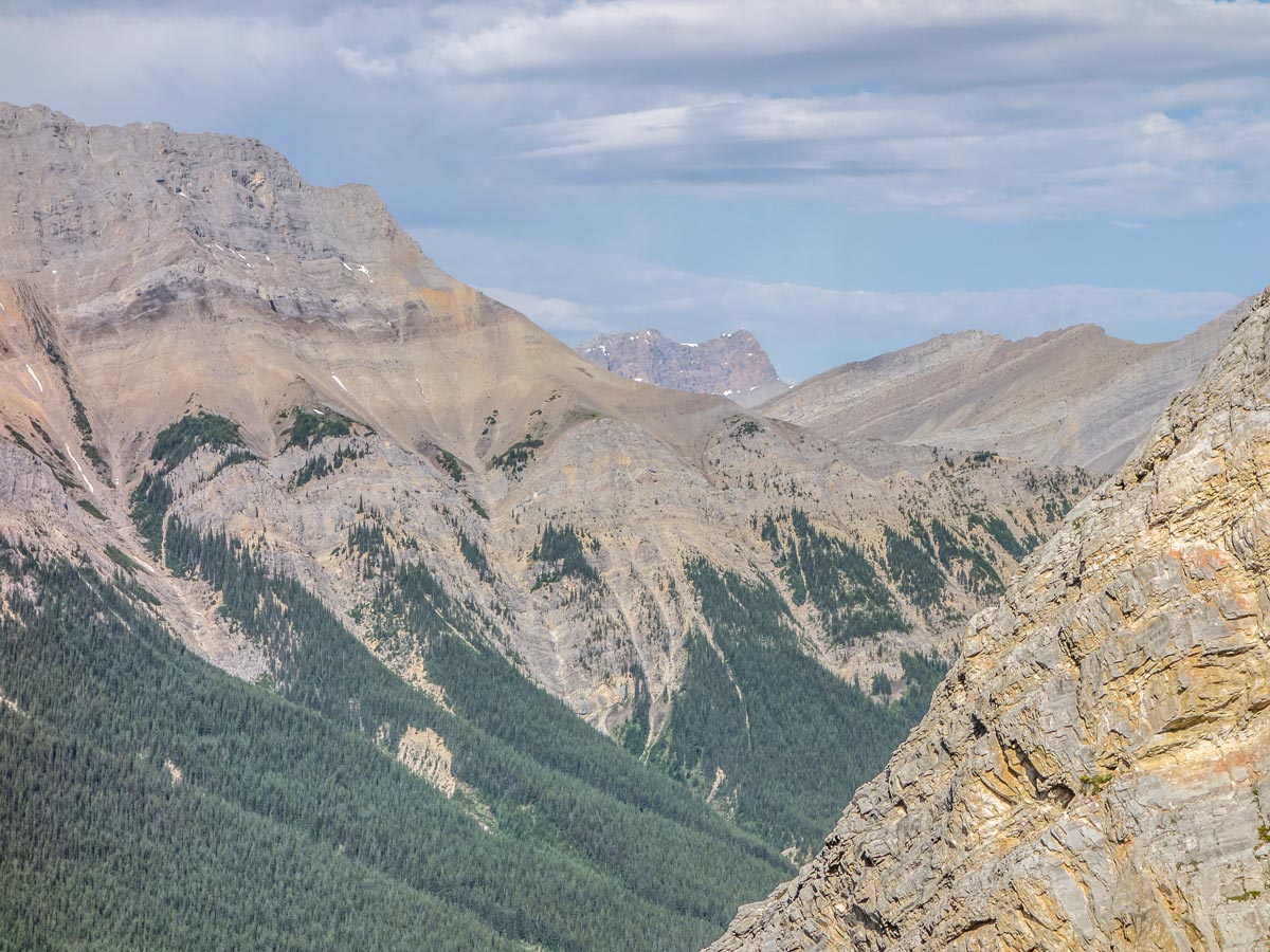 Looking at valley below on Vision Quest Ridge scramble near David Thompson Hwy