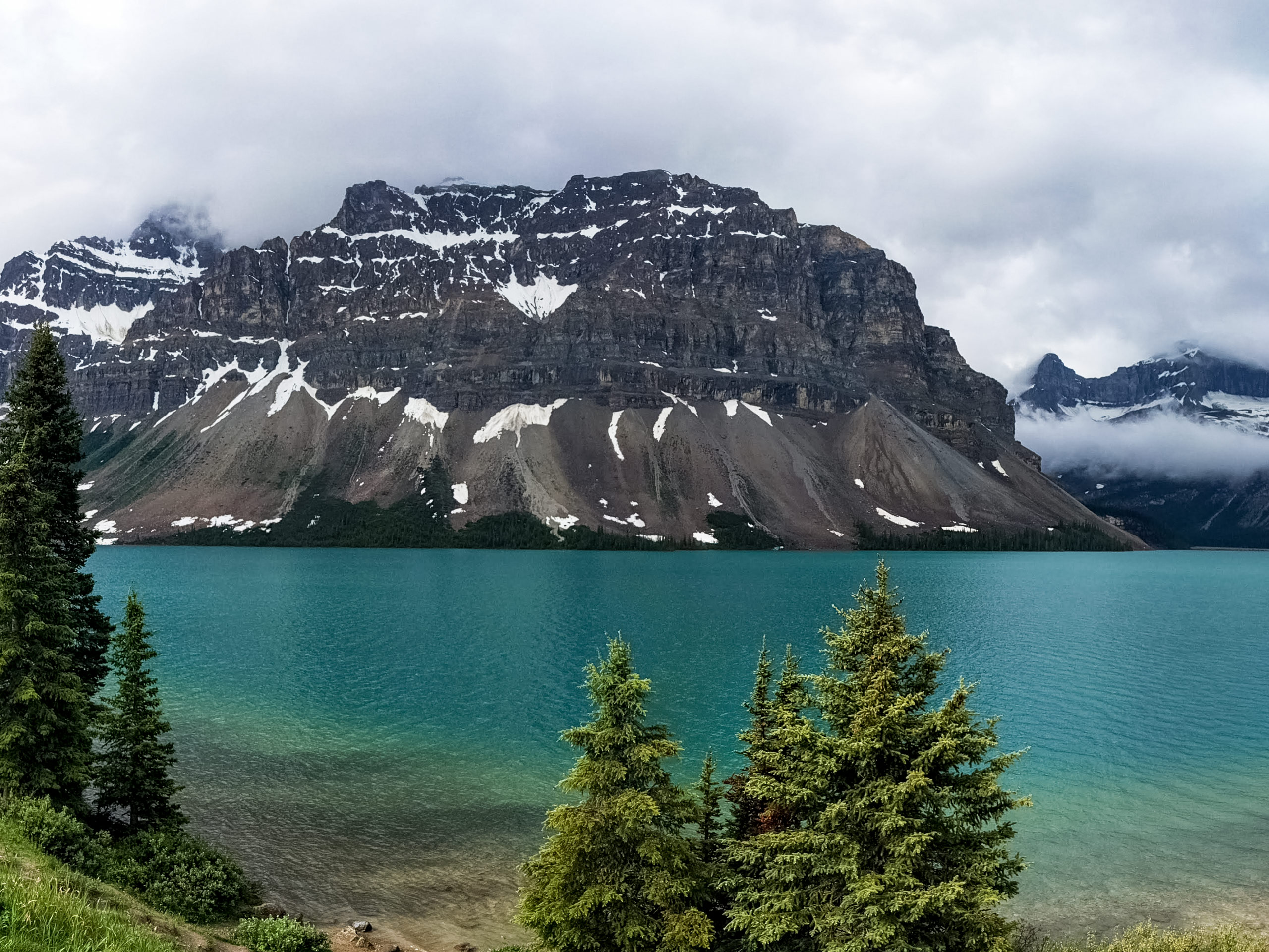 Aqua blue Waterfowl Lake and rocky mountains hiking in Banff National Park