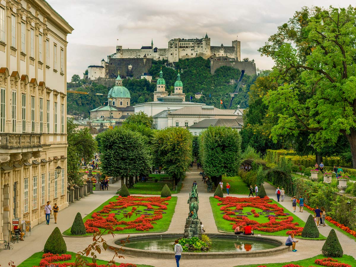 Fortress Hohensalzburg perched high on the hill above Mirabell Palace and gardens