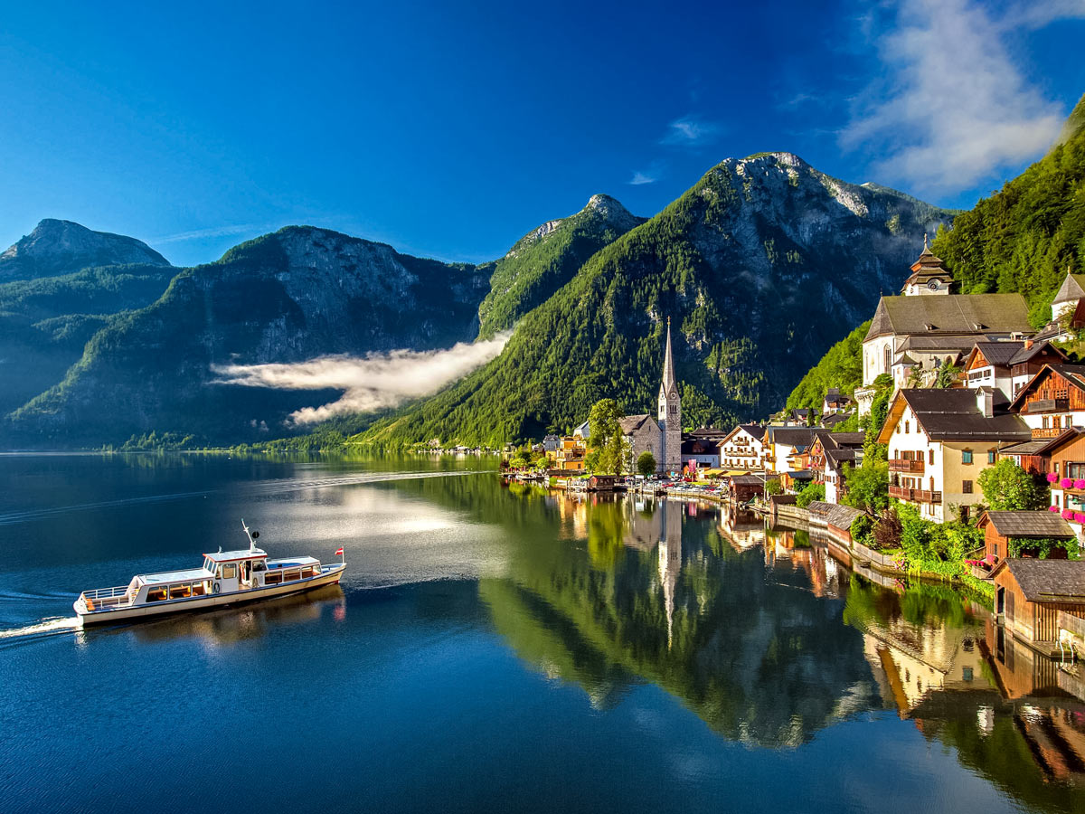 Lake on the shore of Hallstatt 16th century city in the mountains of Austria