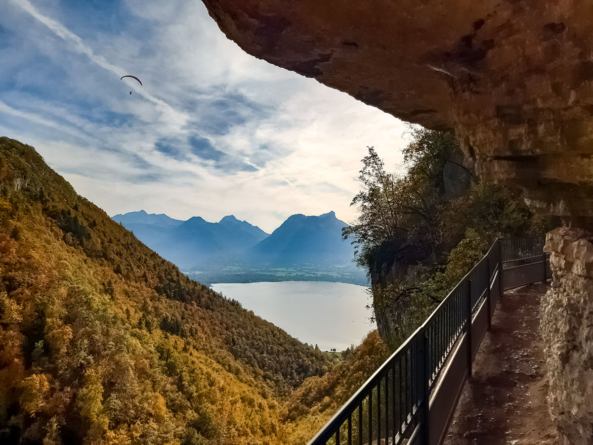 Paraglider lake cliffs Angon waterfalls hiking in France