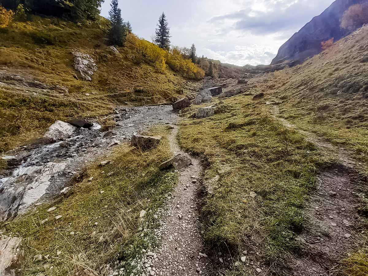Rocky path leading to valley Col Des Aravis hiking trails in France