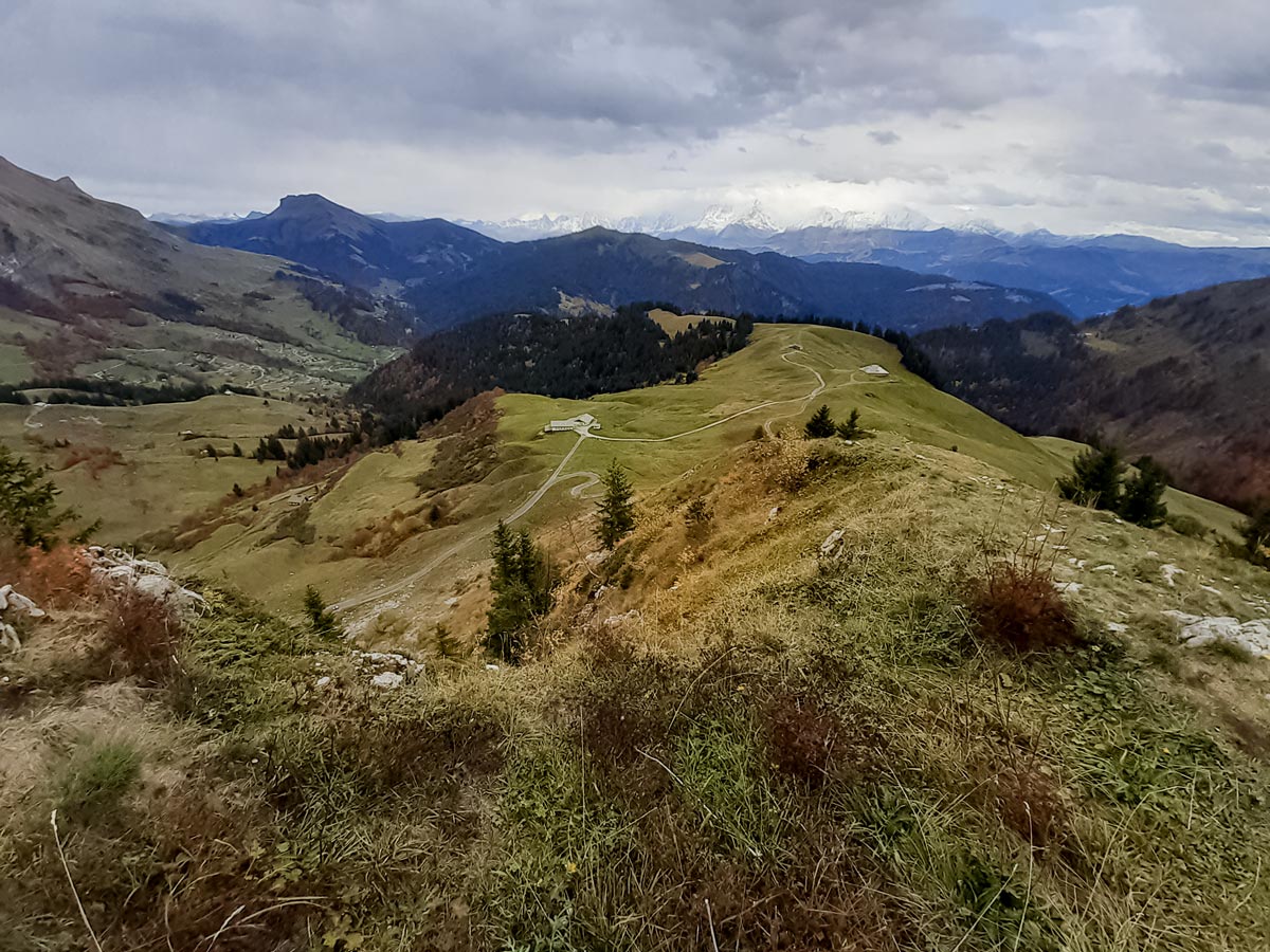 Gravel track below for return Col Des Aravis hiking trails in France