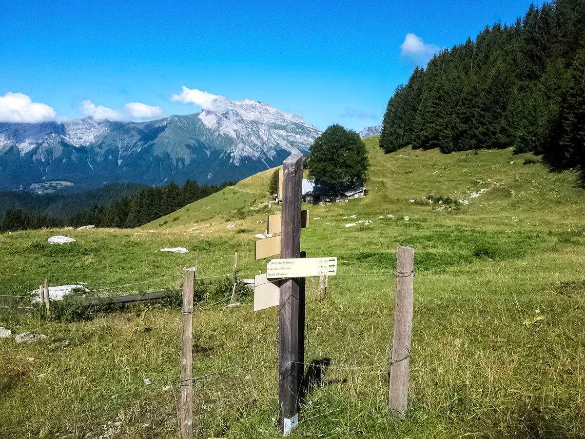 Torest exit signpost hiking Lac du Mont Charvin trail France
