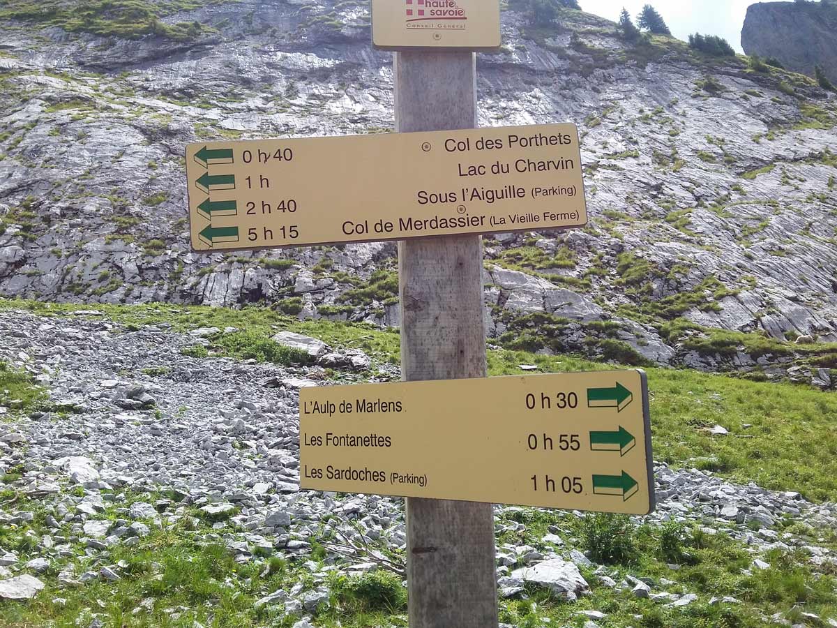 Signpost along track hiking Lac du Mont Charvin trail France