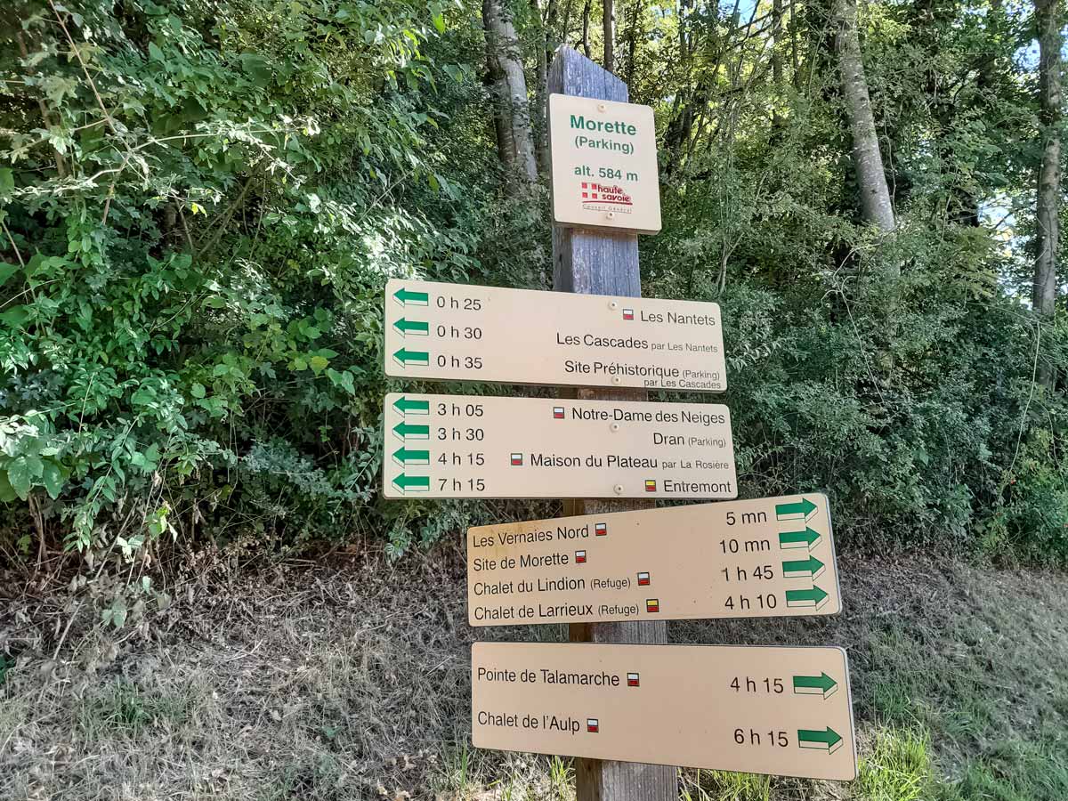 Start hike signpost trailhead along Morette Falls trail France