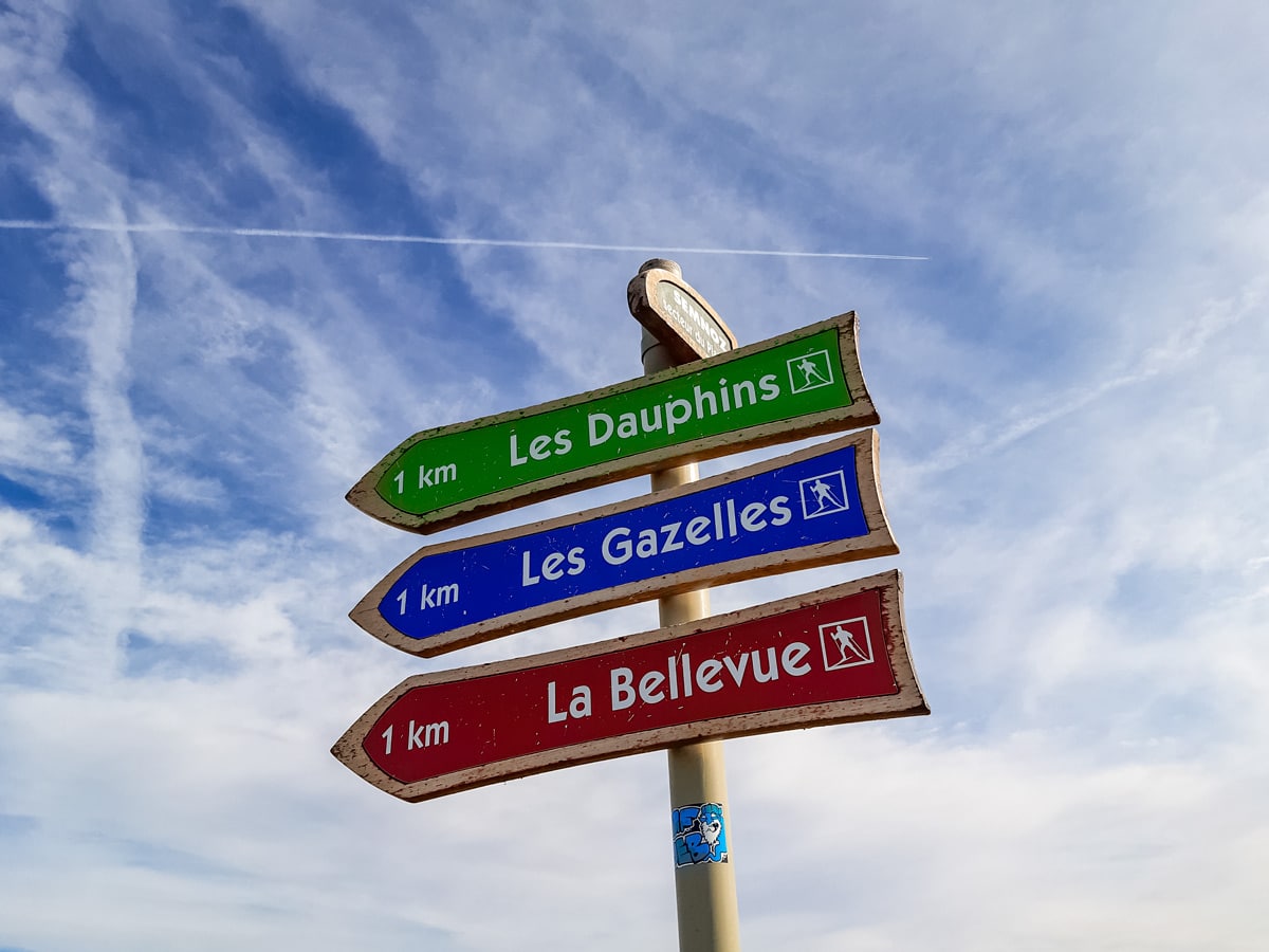 Ski hill signs along Semnoz hike in France