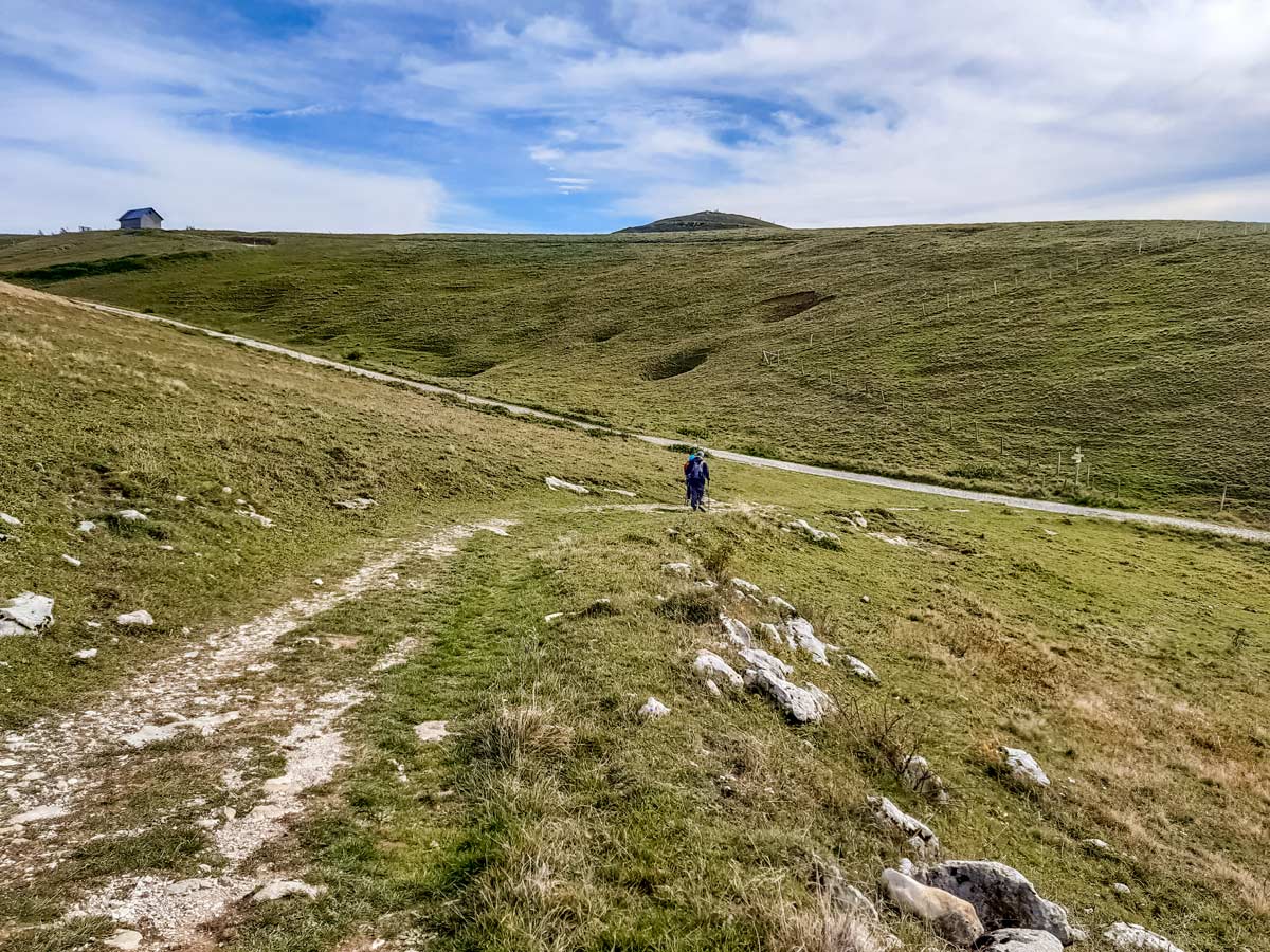 Hike destination hill behind ridge along Semnoz hike in France