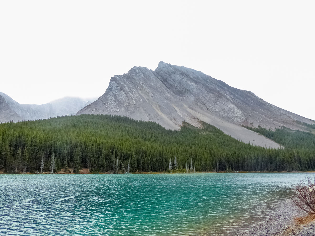 Beautiful lake and Canadian Rockies along Edworthy Falls trail in Kananaskis Alberta Canada