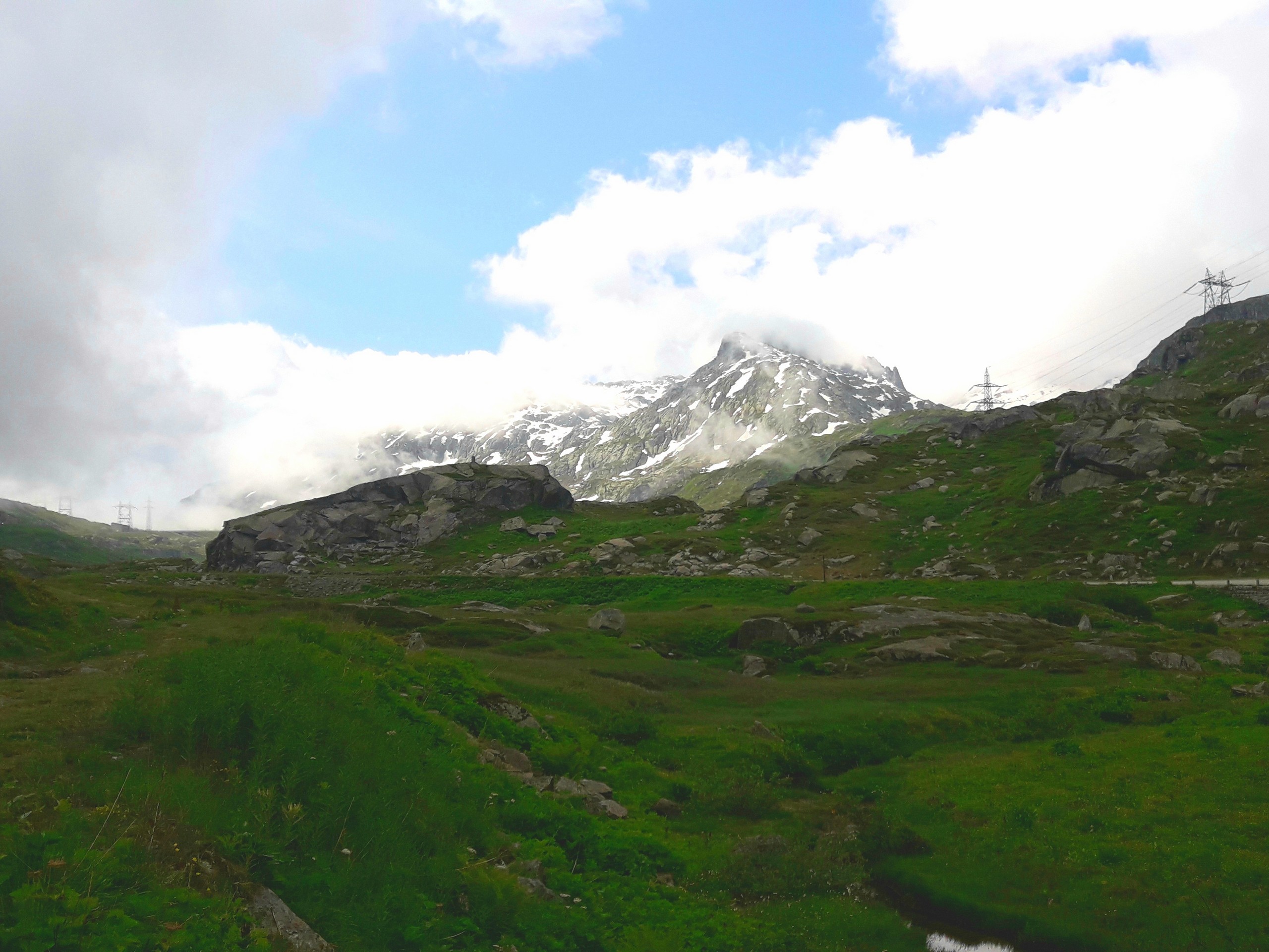 Clouds above the valley of Passo del Gothardo to Hospental trail